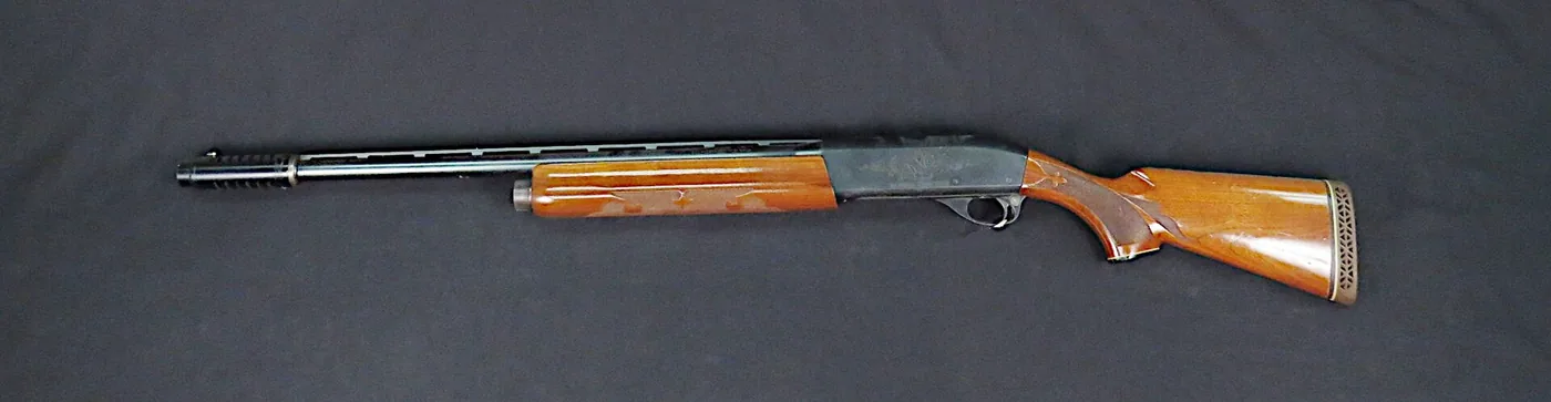Remington Model 1100 semi-automatic shotgun, side view